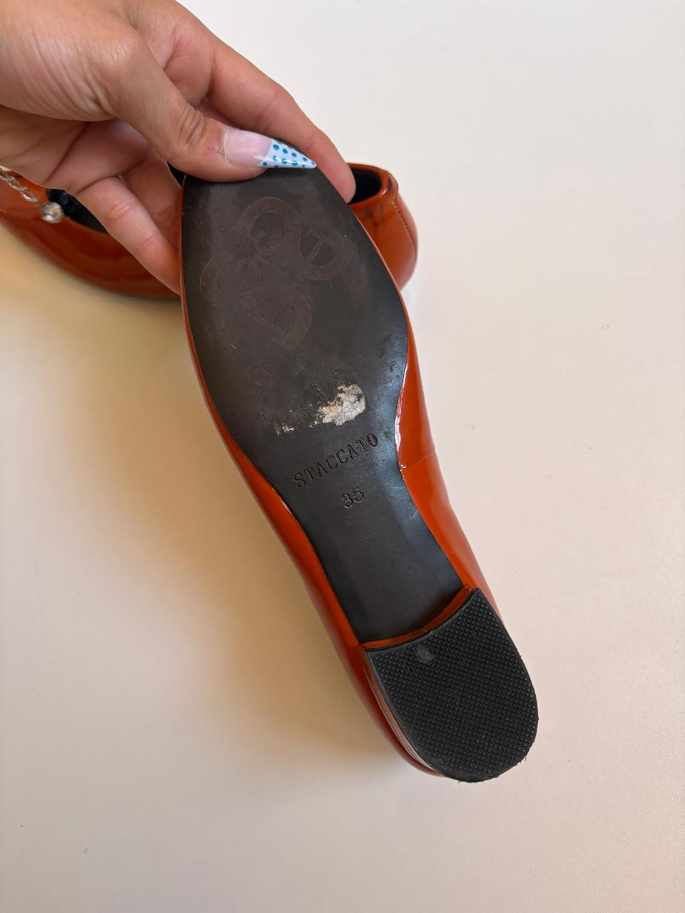 Staccato patent leather flats