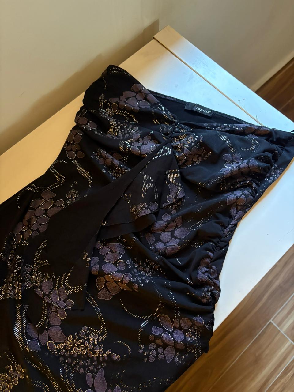 Glittery asymmetric top