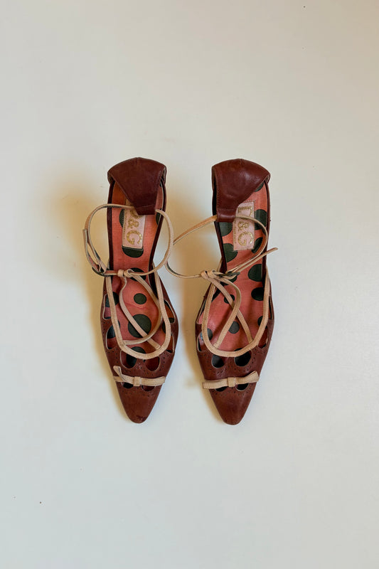 D&g pointy leather bow heels