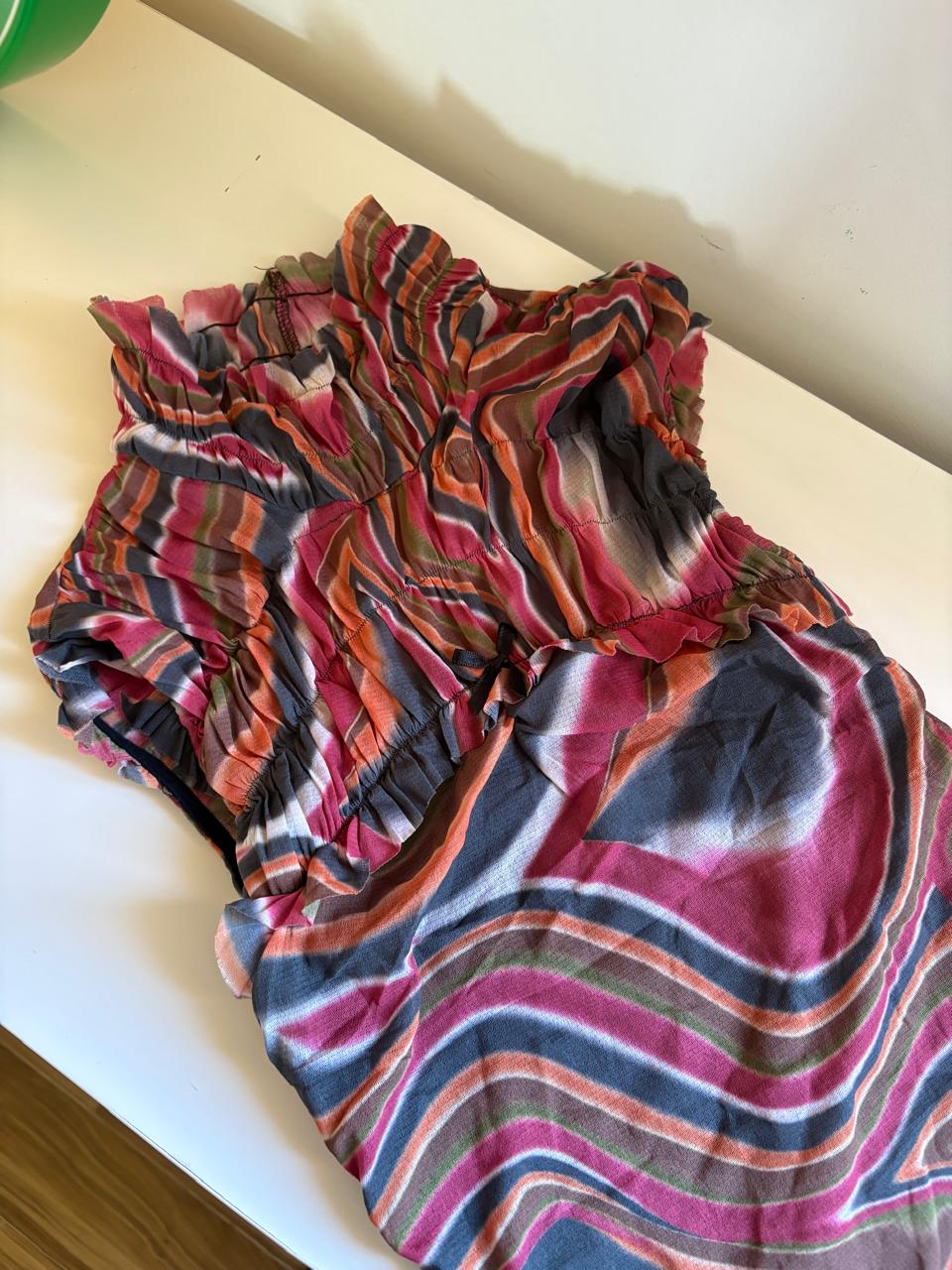 Swirl print mesh turtle neck bow top