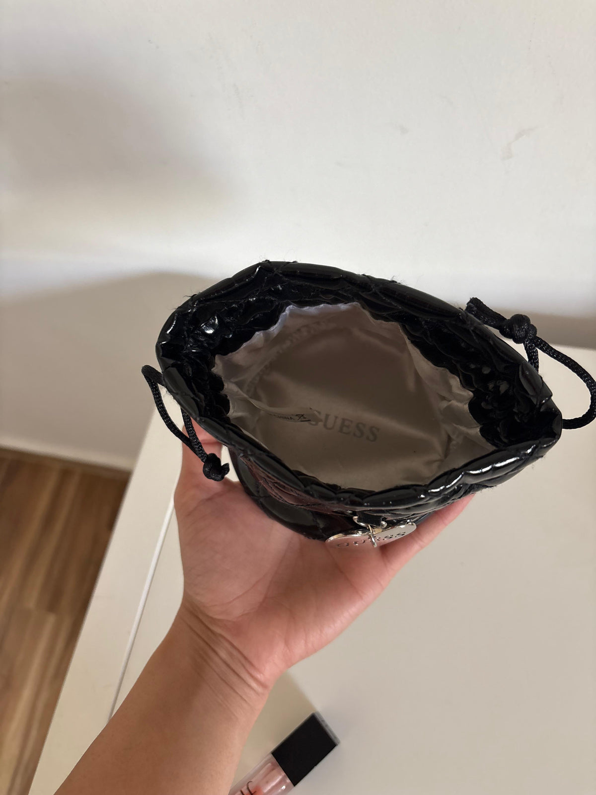 Guess patent mini jewelry pouch