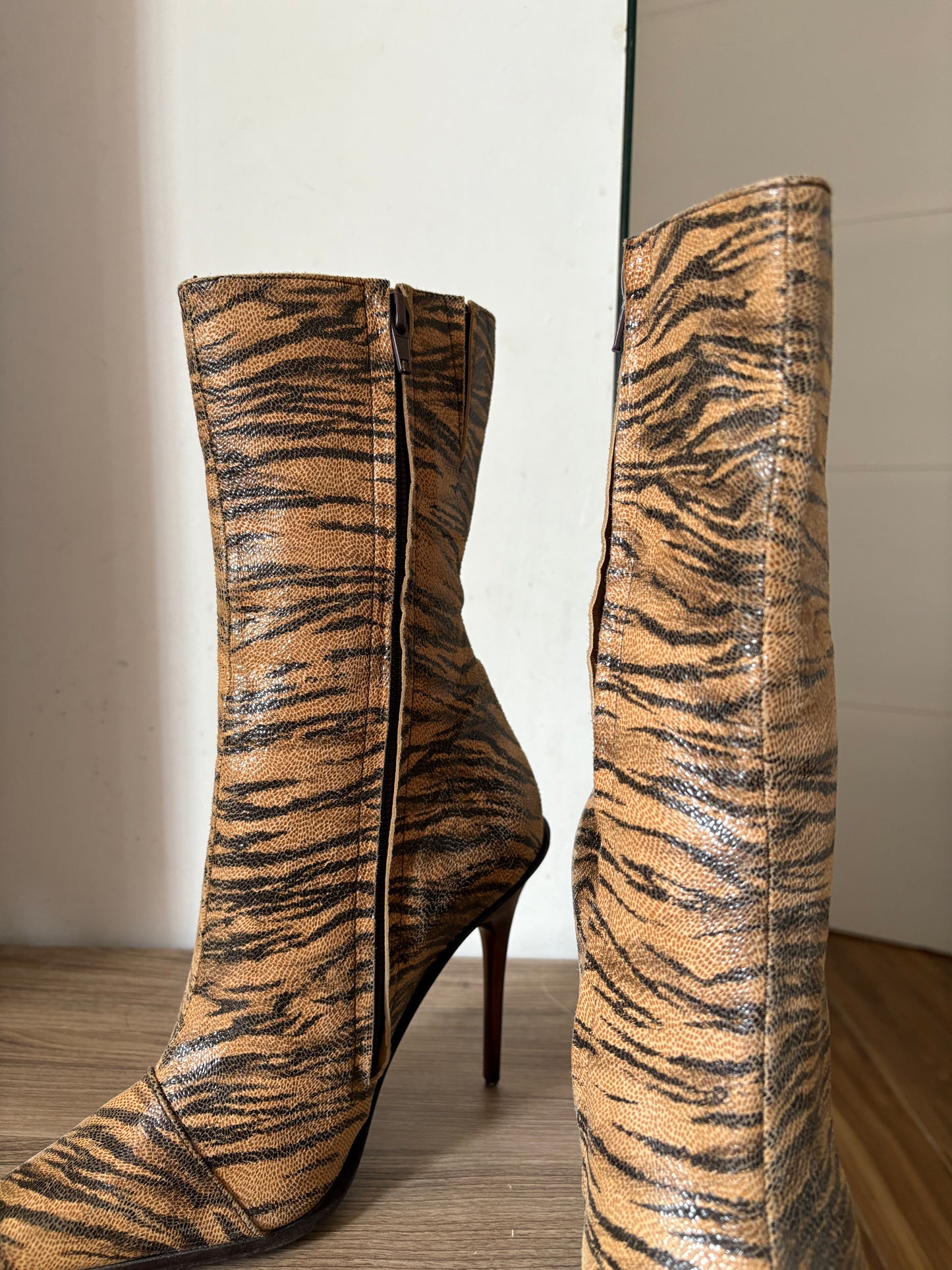 Tiger leather pointy heeled boots