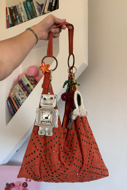 Studded suede unsymmetrical shoulder bag