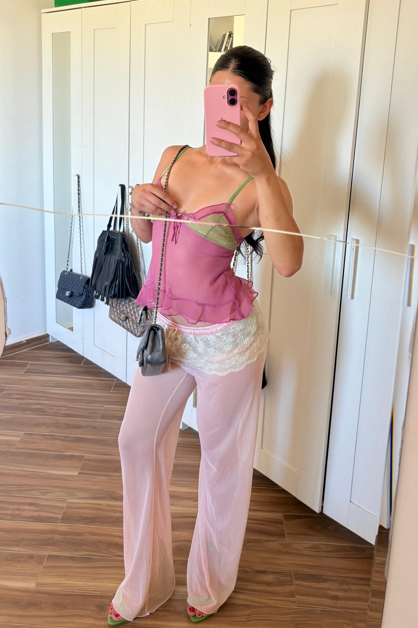 Pink sheer mesh flare leg with lace details pants